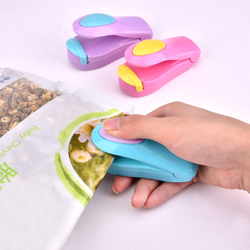 Kitchen snack pressure heat sealing machine plastic sealing machine
